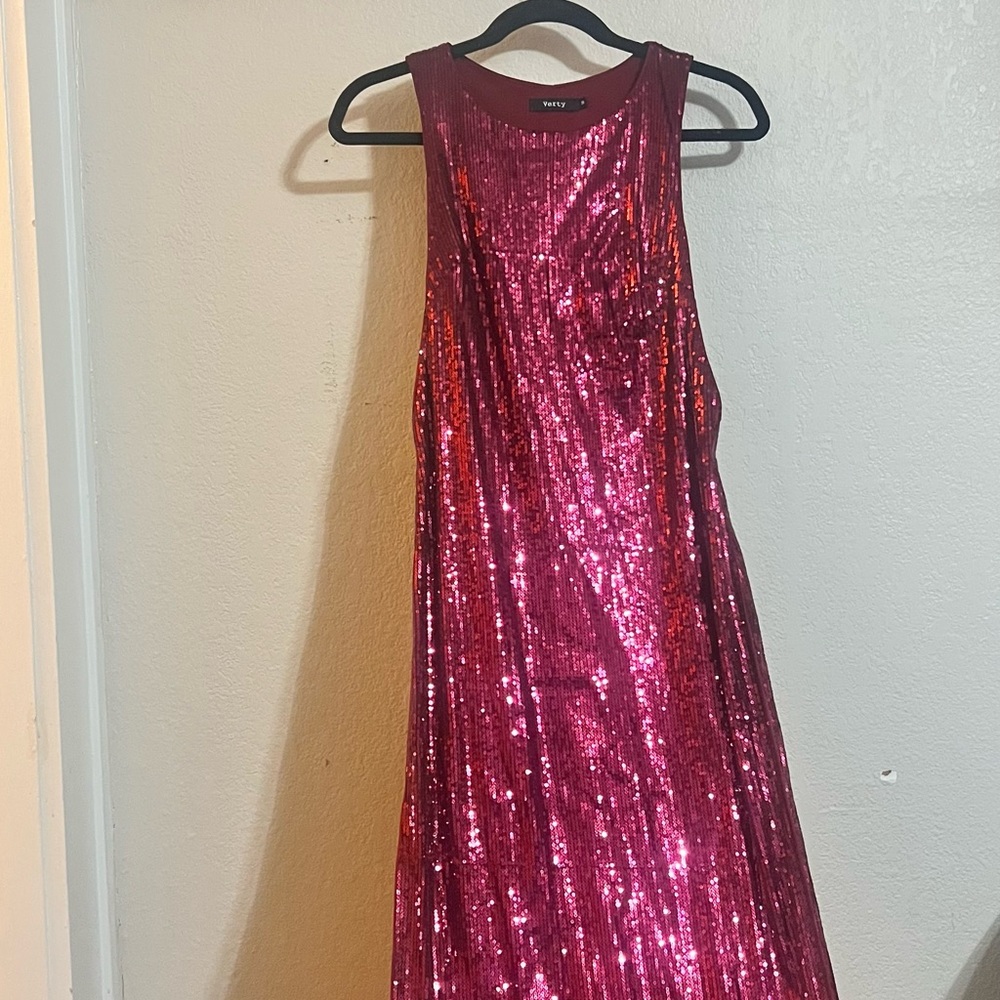 Sequined tunic top with long skirttail